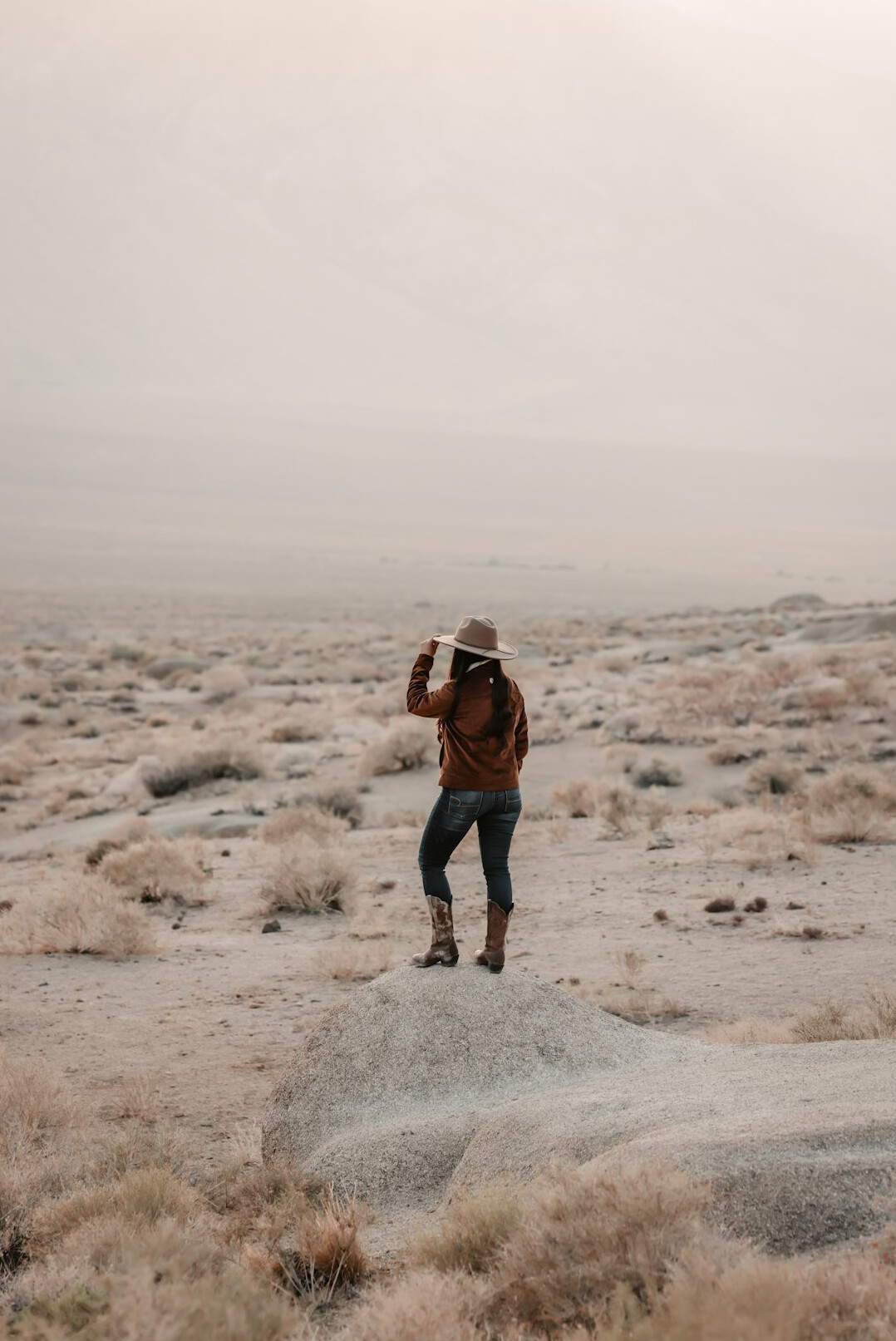 photographer with camera in rural area