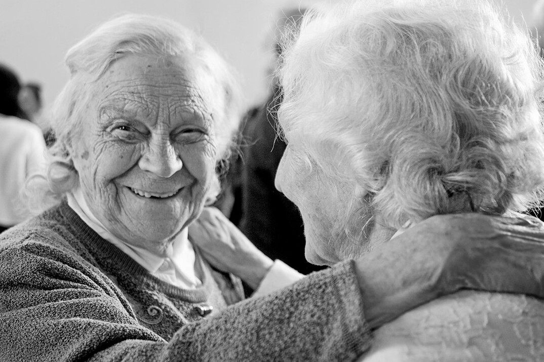 elderly man sharing story