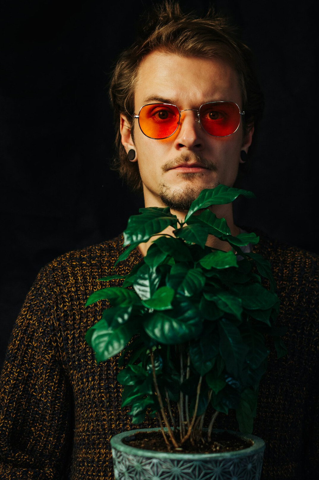 Studio portrait of a polish man journalist with glasses