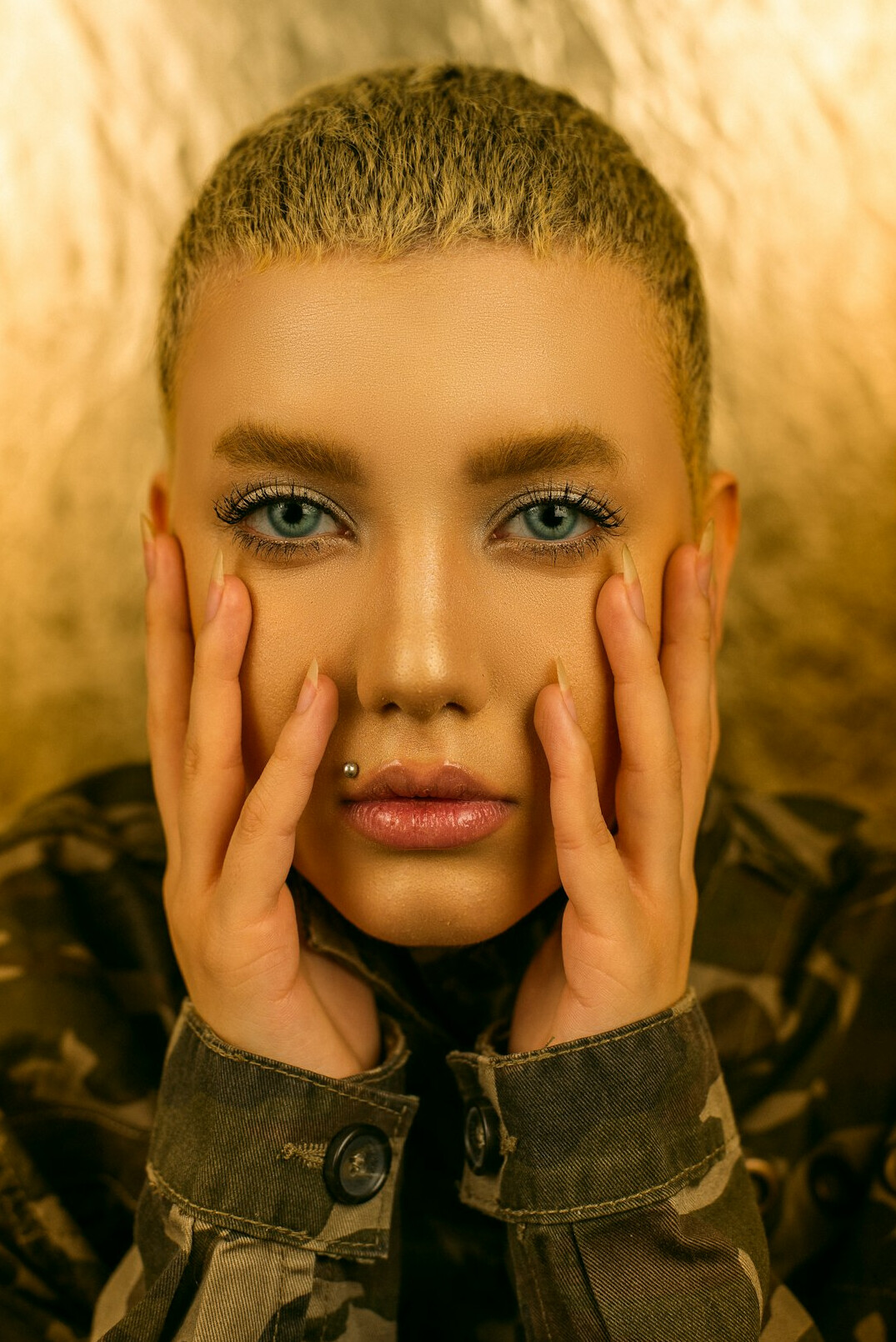 Studio portrait of a young polish woman photographer with short hair
