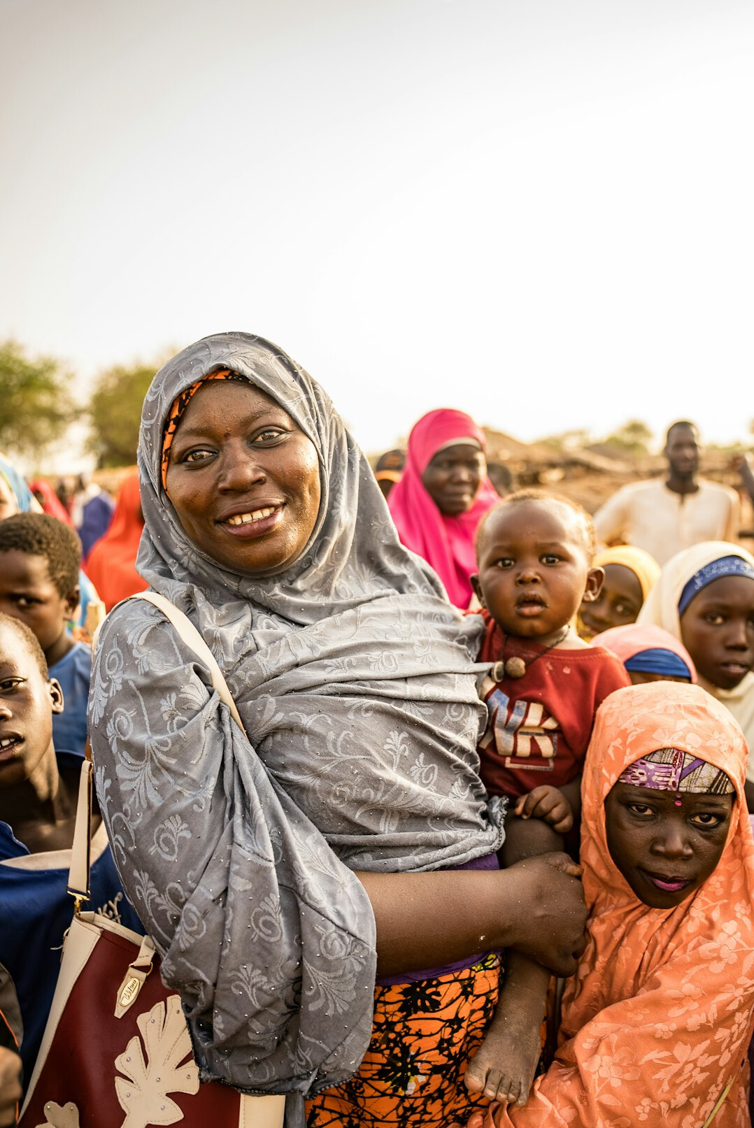 group of villagers smiling