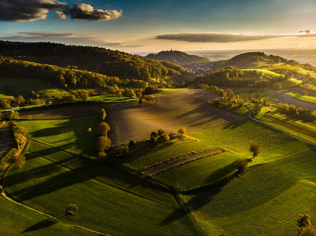 Rural Polish landscape with fields and a distant village